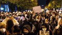 China: Covid-kontroles verlig ná betogings